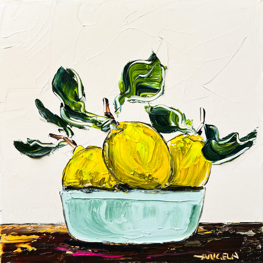 Three Lemons in a Green Bowl
