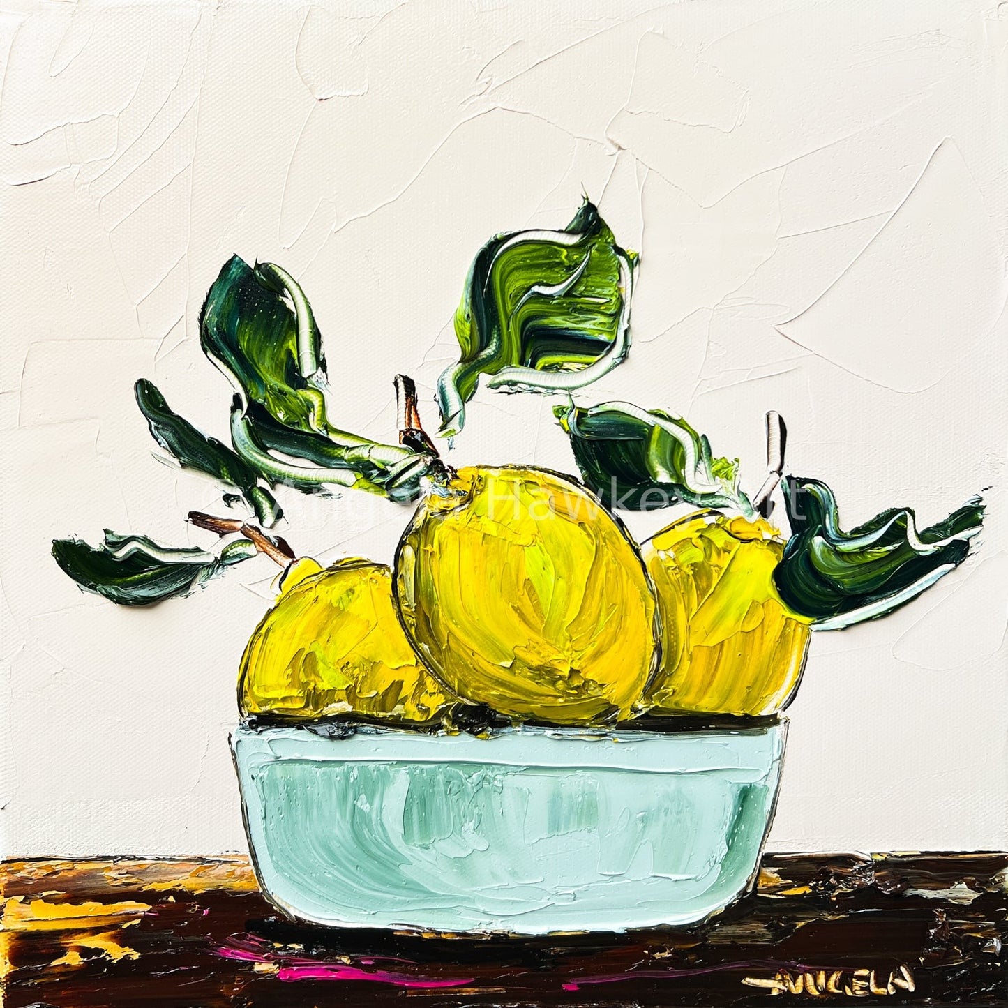 Three Lemons in a Green Bowl